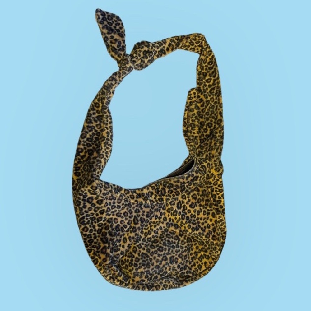 Bath & Body Works furry leopard purse